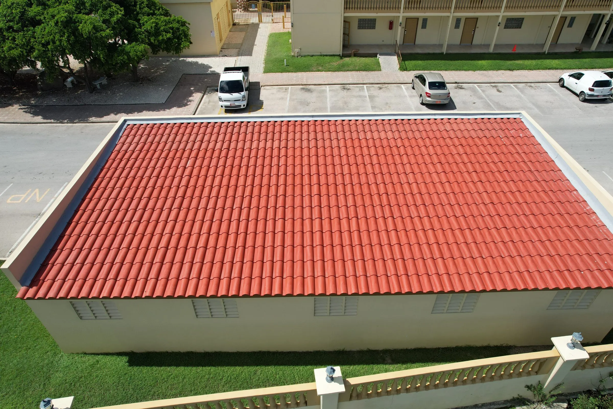 Long red clay tile roof seen from above
