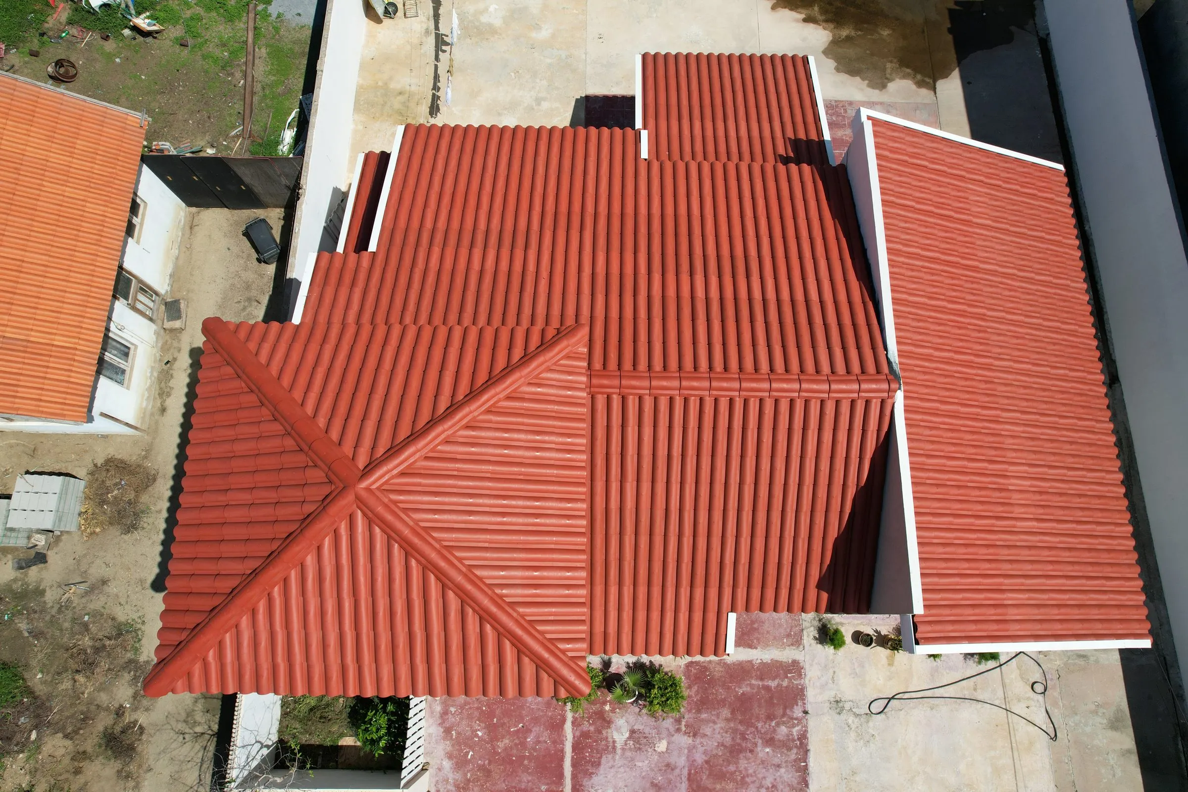 Red clay tile roof seen from above